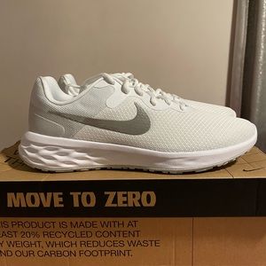 Women size 9 Nike “Revolution 6 NN”. White. Brand new, never worn.